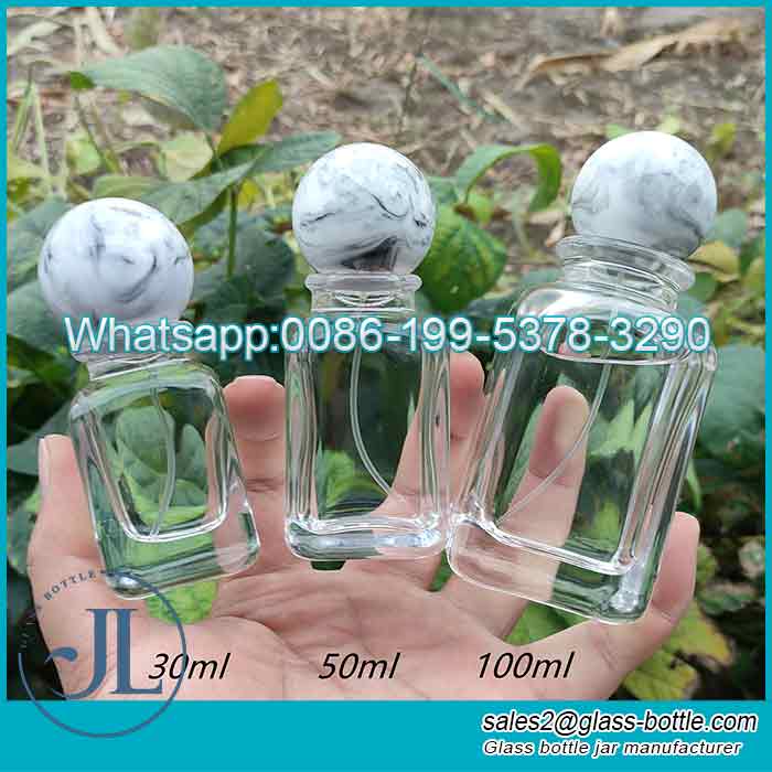 30ml、50ml、100ml Cylinder shape glass perfume bottle is designed complete style and we support customization.We have professional designer to provide surface layout and unique logo design.S/S, H/S, label sticker,marble coating, holographic coating, metalizing, flocking, etc.30ml、50ml 100ml Glass perfume bottle have shape design smooth lines, plenty of colors to choose from. Of course, you can also customize your preferred color.