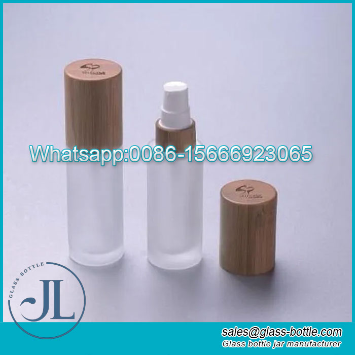 Bamboo wooden pump lotion glass bottle supplier