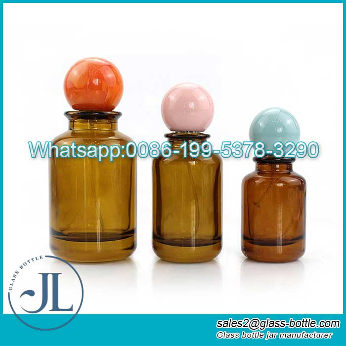 Wholesale cylinder amber spray perfume bottle with ball lid